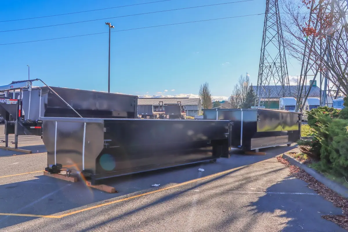 Roll-off dumpster ready for waste disposal at job site for Roofing Dumpster Rental in Lawrence